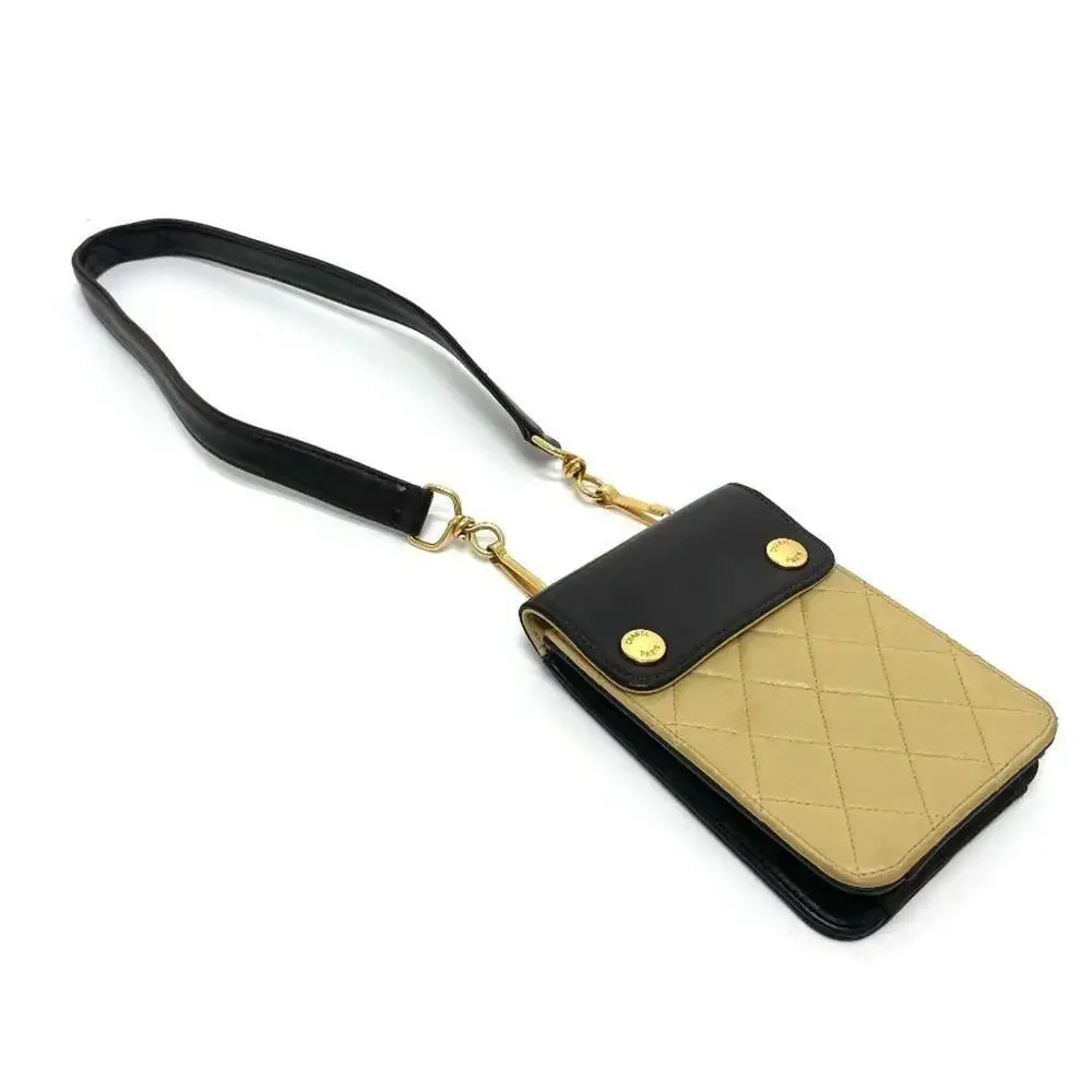 CHANEL Black Pochette Bag
